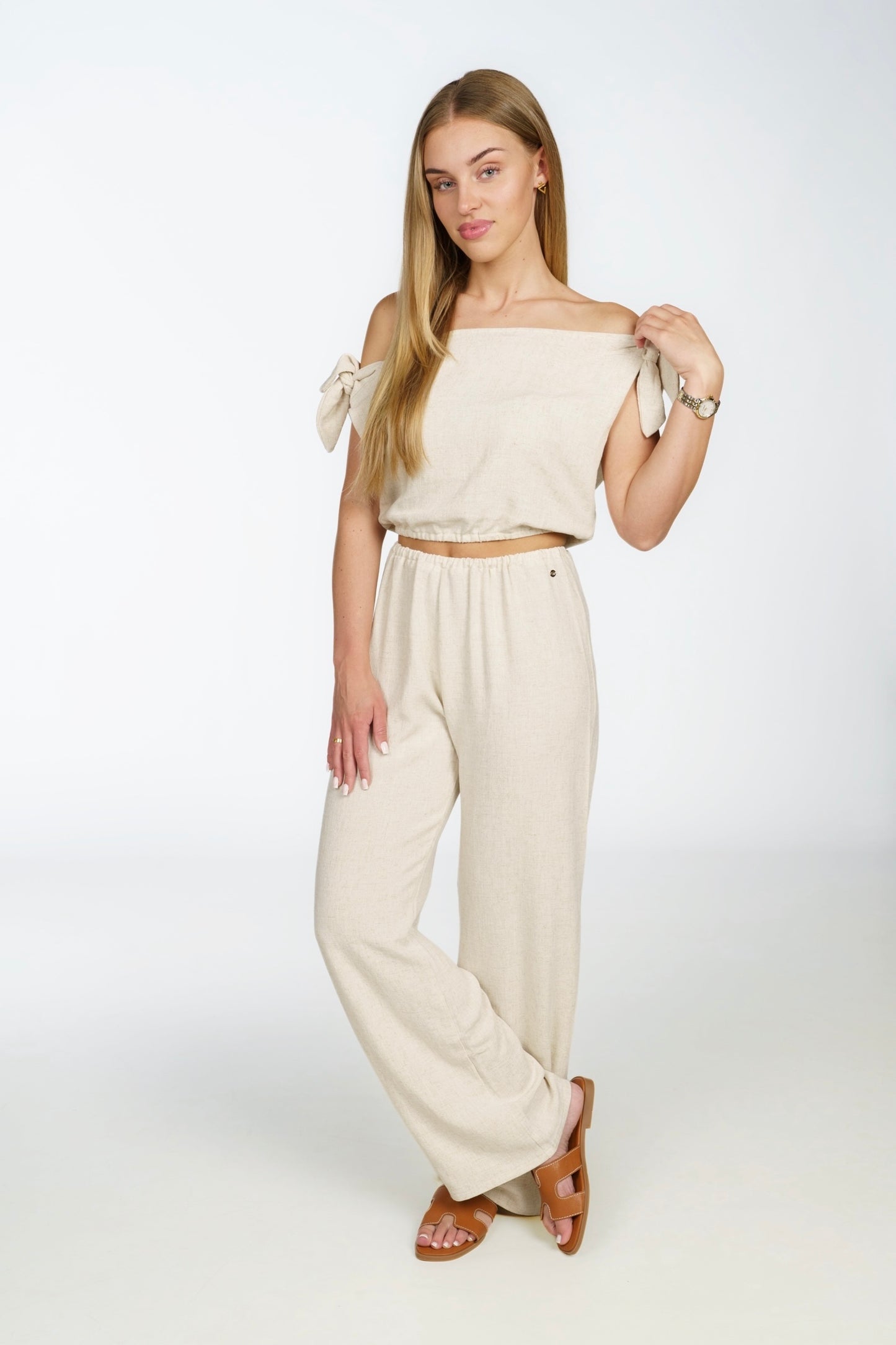 Women's Linen Summer Set - Comfortable and stylish, this two-piece outfit includes breathable linen pants and a matching top. Perfect for warm weather, this organic linen set is eco-friendly and ideal for casual chic, beachwear and vacation style. Stay cool and stylish with this lightweight fashion essential.